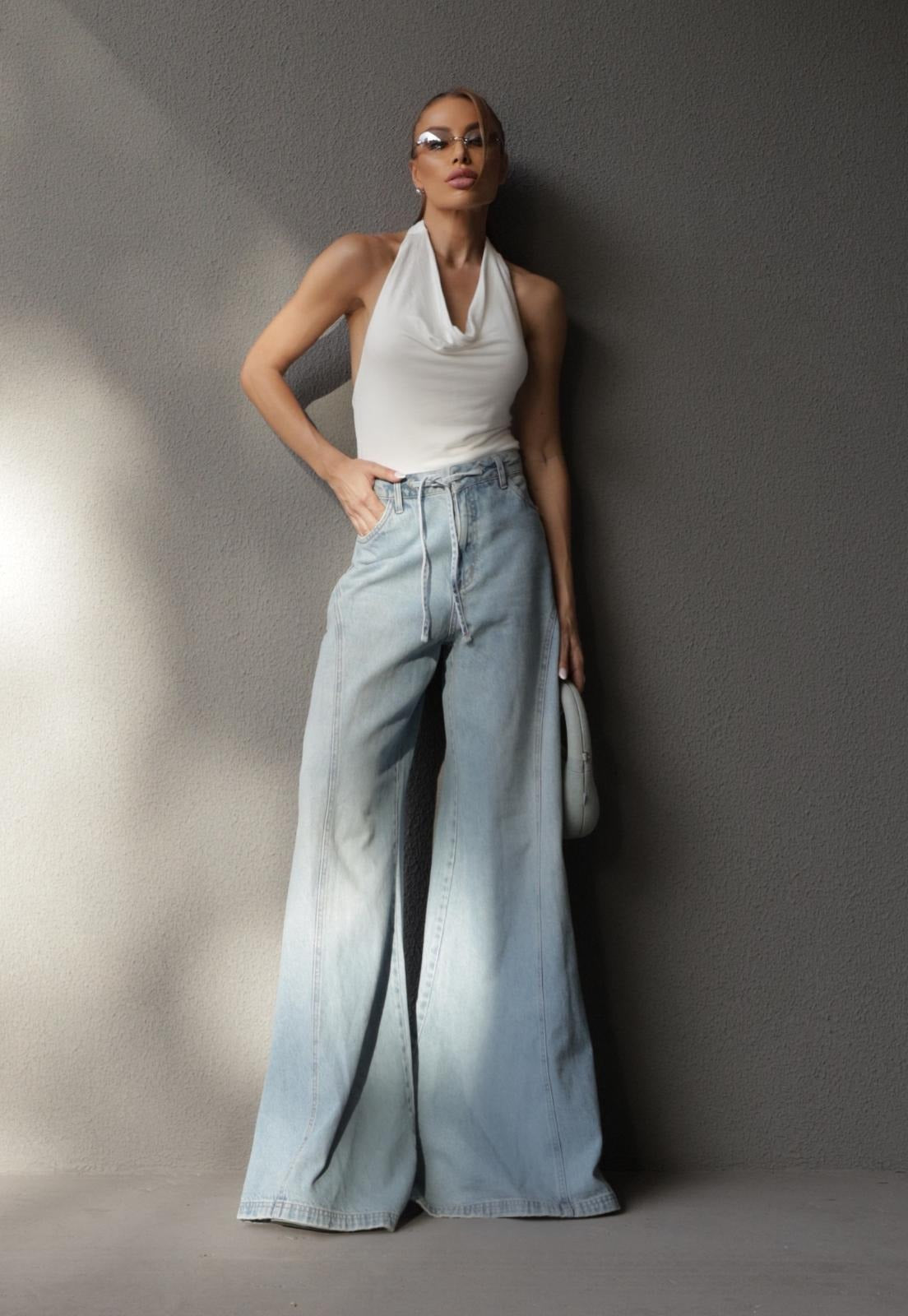 CALÇA JEANS ESTONADO COS ALTO C/ TIRA AJUSTA JEANS